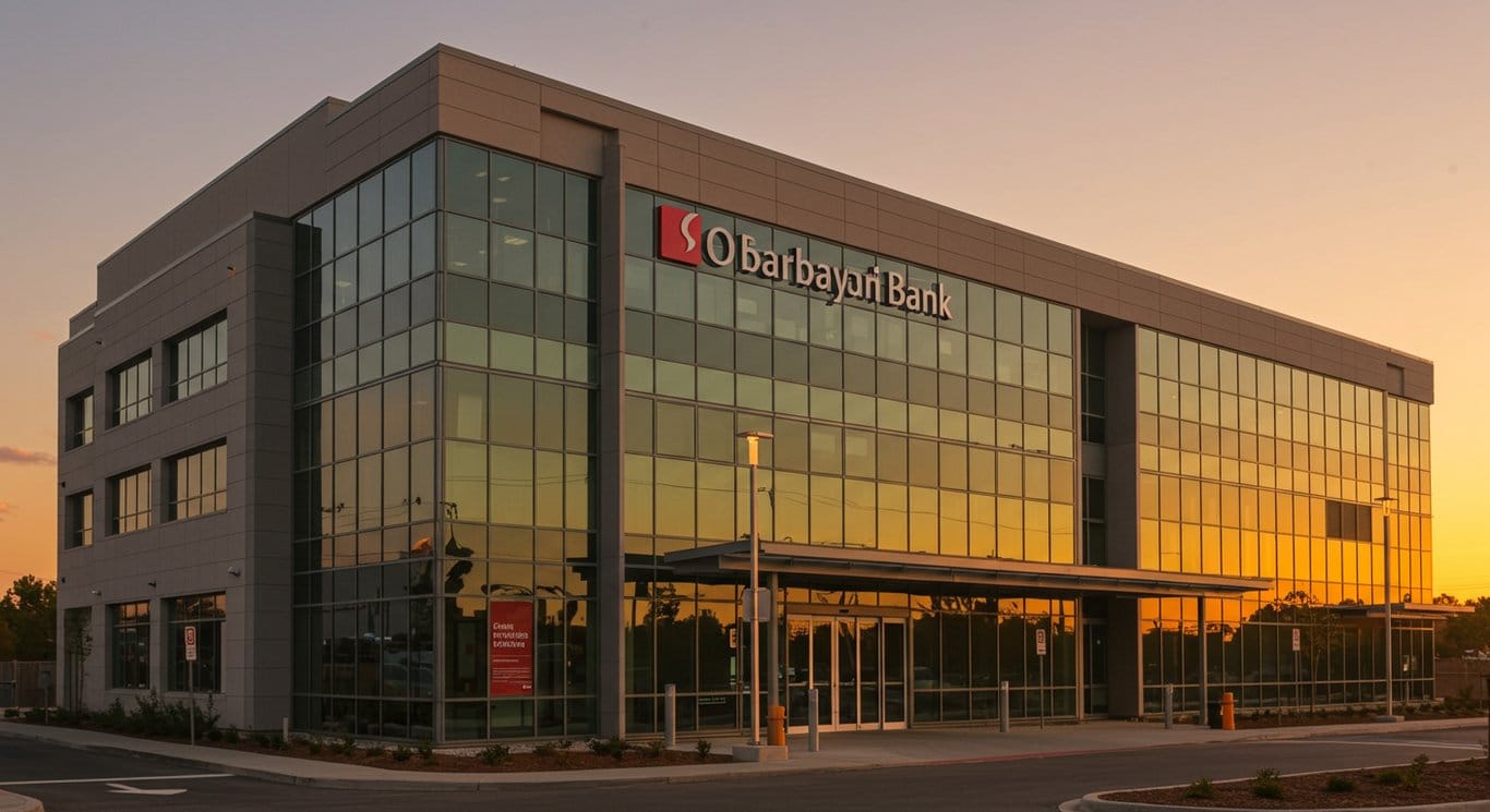 Modern bank building at sunset, symbolizing financial stability and growth.