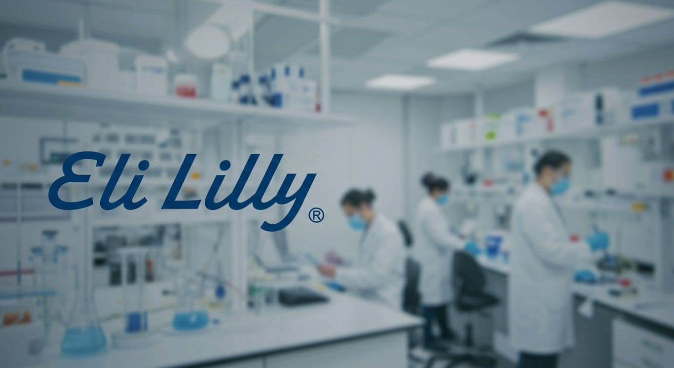 Eli Lilly logo displayed against a modern laboratory backdrop.